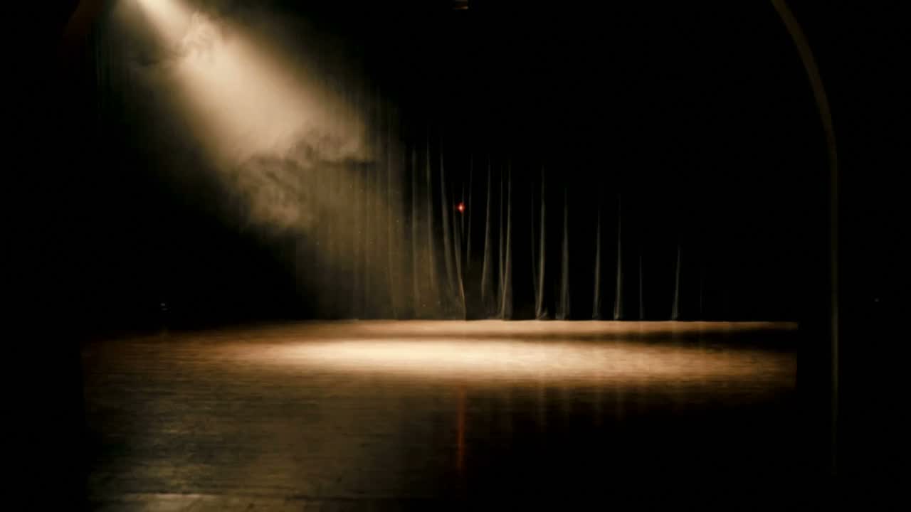 The doorway onto the floor, one beam of light through the haze